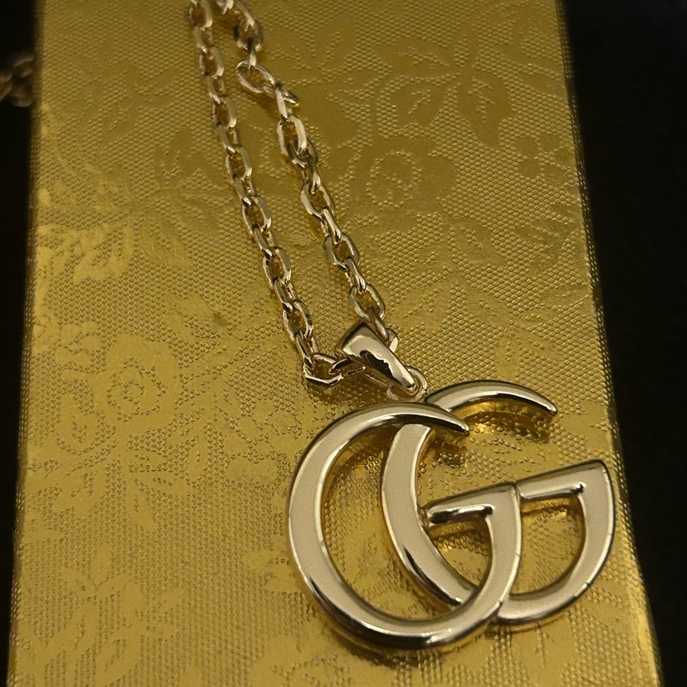 Vintage Gucci Gold Logo Necklace
